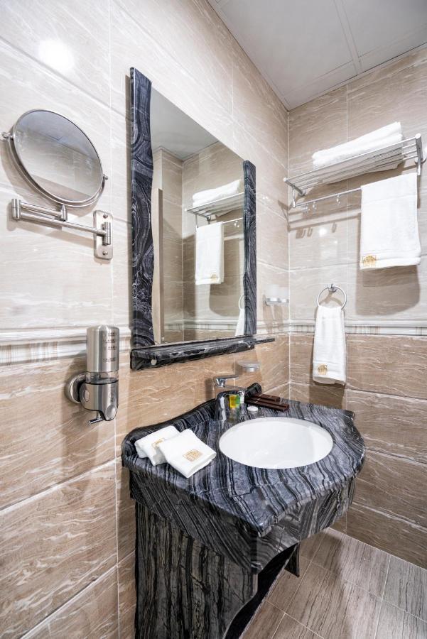 Al Amerat Hotel Al Amarat Bagian luar foto