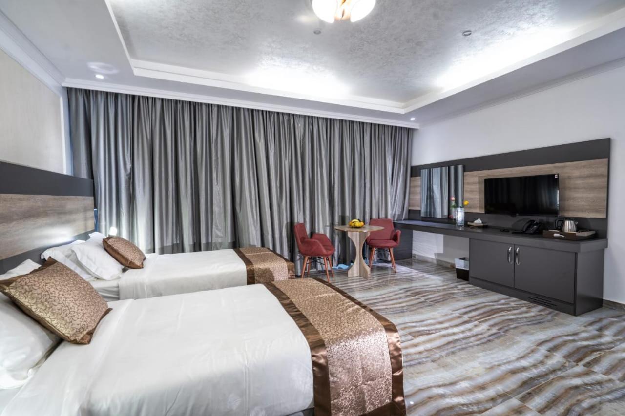 Al Amerat Hotel Al Amarat Bagian luar foto